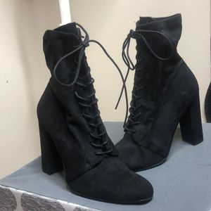Black lace-tie heeled boots